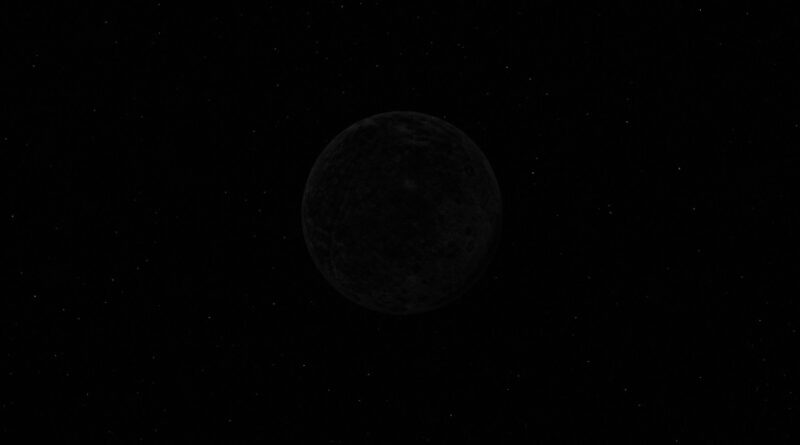 太陽光を失い、漆黒の闇に溶けていく冷たい岩石としての月
